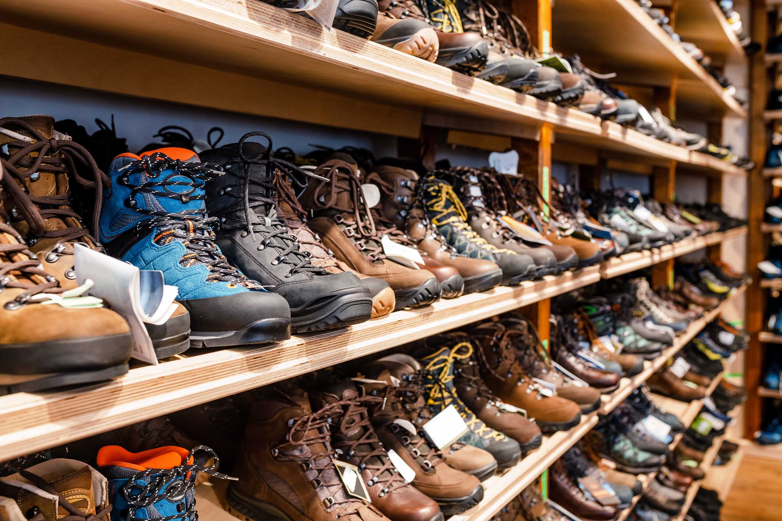 Hiking boots displayed for shoppers preparing to explore Acadia National Park